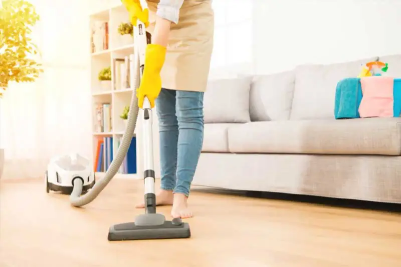 Cleaning a kitchen floor in a tidy home